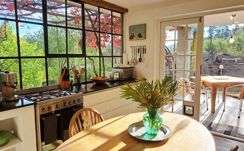 kitchen with views to patio and garden