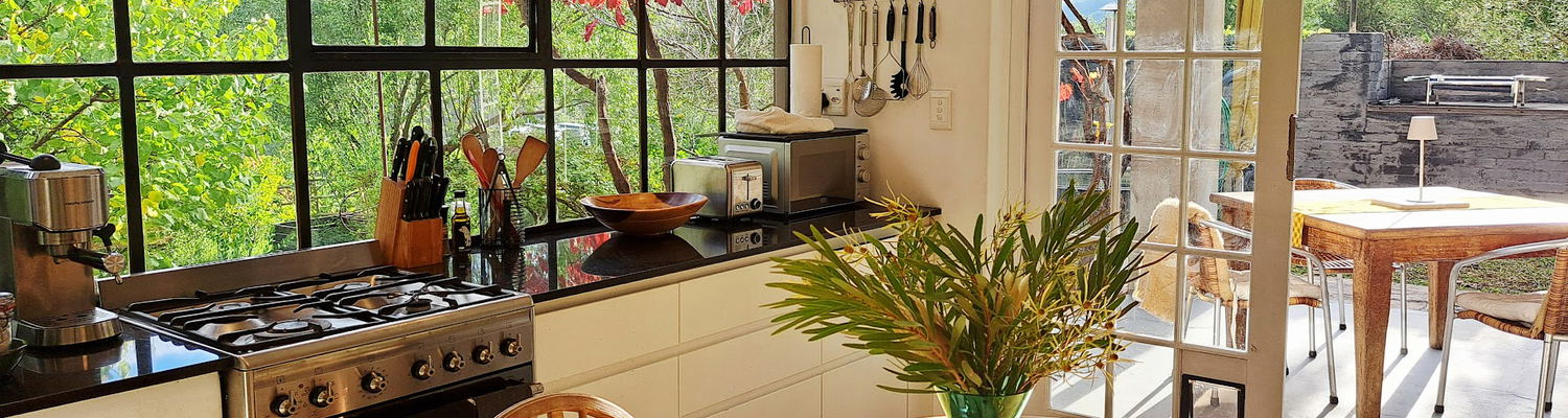 kitchen with views to patio and garden