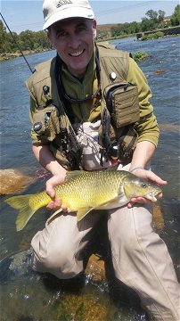 Fly fishing for indigenous small mouth yellow fish with an experienced guide on the Vaal River. The Vaal river is one of the largest rivers in South Africa with amazing sport fishing potential. 