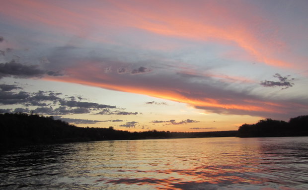 A sunset is always iconic on the Zambezi River in Zimbabwe and marks that time of the day when humans and animals can rest from the hot african sun. At Sundowner Zambezi Lodge this is the perfect time to relax and reflect on the beauty of the incredible area which savouring and ice cold refreshment.