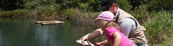 Dads and daughter fishing together on Fathers Day