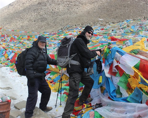 Tibetan Buddhist offer prayers flags for good health and lucks in higher ground.