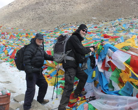 Tibetan Buddhist offer prayers flags for good health and lucks in higher ground.