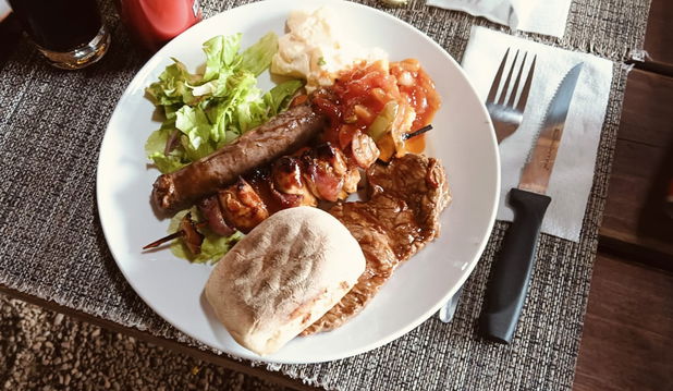 Tuck into a traditional South African braai during your Addo safari shore excursion from Port Elizabeth with Into Tours.