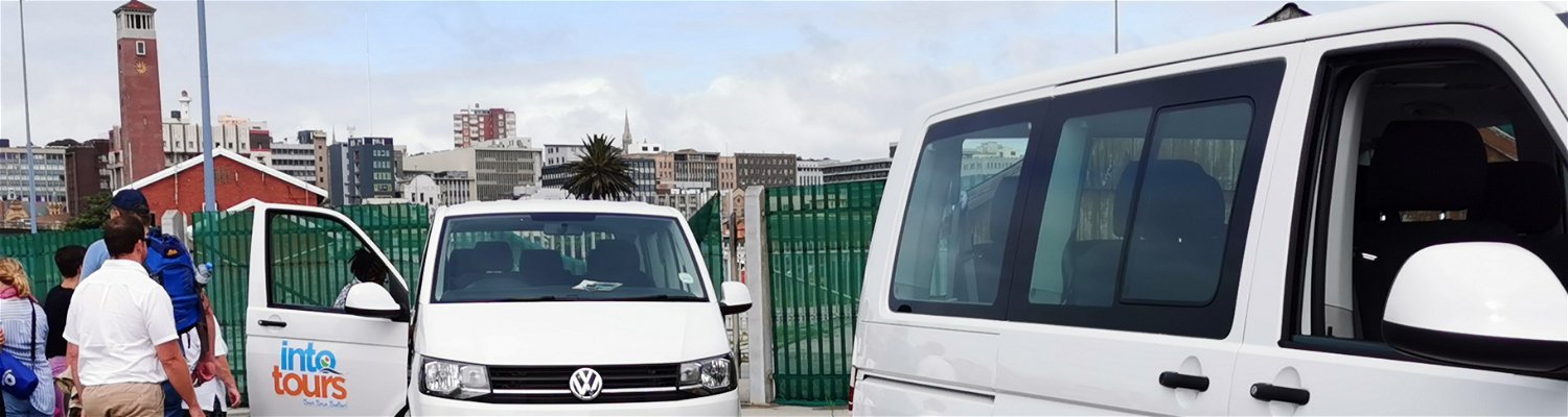 Travellers getting into a clean and sanitised tour vehicle with Into Tours a South African tour operator conducting safaris, family-friendly tours, city sightseeing tours and Winelands tours in Cape Town 