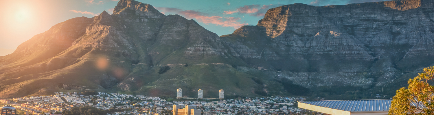 Picture of Cape Town Mother City, City Bowl with sun over Table Mountain in Cape Town 