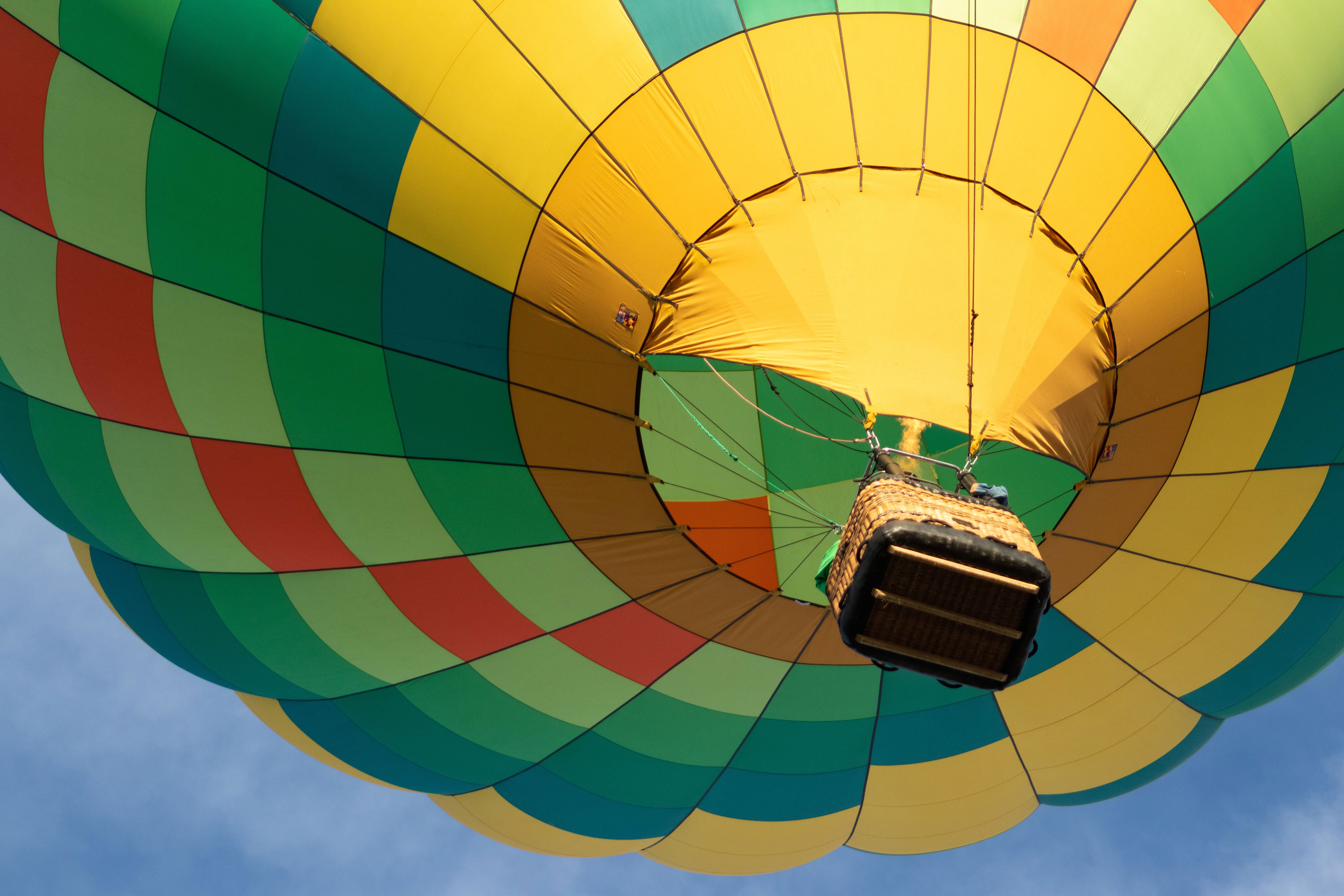 Hot-air Balloon taking off in flight over the Cape Winelands 