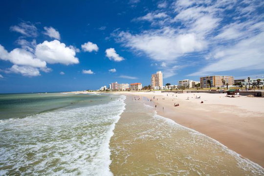 Hobie Beach, King's Beach, Port Elizabeth, Gqeberha, South Africa, sunny day, beach activities, oceanfront buildings, coastal scenery, outdoor fun, travel destination, tourism Hobie Beach, King's Beach, Port Elizabeth, Gqeberha, South Africa, sunny day, beach activities, oceanfront buildings, coastal scenery, outdoor fun, travel destination, tourism