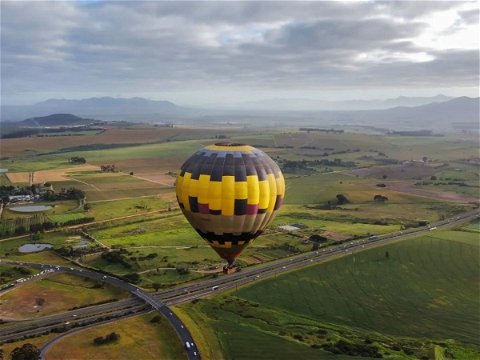 hot air ballooning over cape winelands in Cape Town book gift experience vouchers and tickets and tours in Cape Town bucket list with Into Tours   