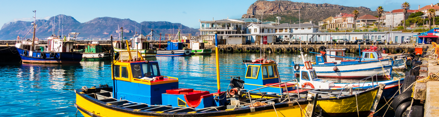 kalk-bay-main-road-cape-town-south-africa-accomodation-street-view-resturants-fish-chips-mountain-sea-fishing-boats-kalk-bay-harbour-kalk-bay-cape-town-tours-into-tours-cape-town-attractions-things-to-do-cape-town-private-tours-cape-town