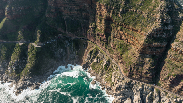 Scenic drive along Chapmans Peak, on a Cape Peninsula and Cape Point Tour, including Cape of Good Hope, Boulders Penguins Tour and Cape Town Tour Into Tours