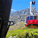 Table mountain in Cape Town, riding the table mountain cable car that summits to the top of Table Mountain as seen on a guided Cape Town tour with Into Tours, tour operator in Cape Town 