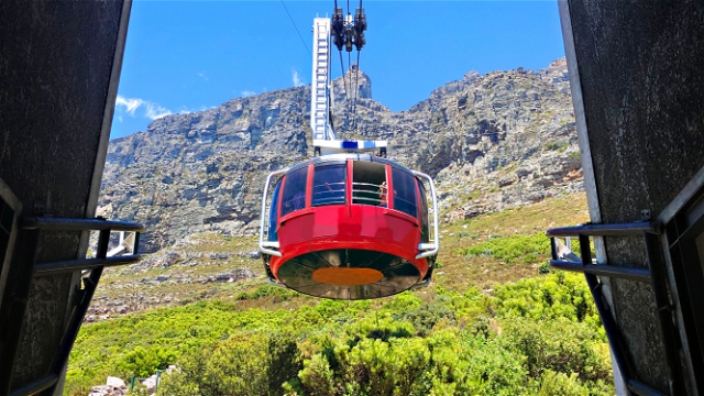 Table mountain in Cape Town, riding the table mountain cable car that summits to the top of Table Mountain as seen on a guided Cape Town tour with Into Tours, tour operator in Cape Town 