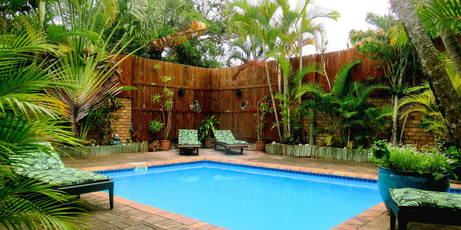 Relaxing, quiet pool area with sun loungers at Bhangazi Lodge.