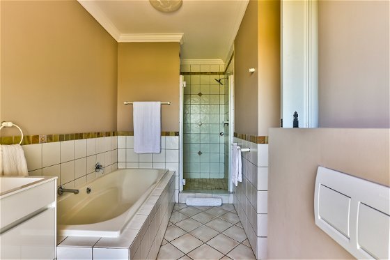 Superior De Luxe Suite Blackwood Bathroom with bath and shower