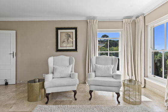 Oak Superior Deluxe Suite Bedroom Seating Area