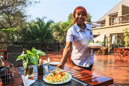  Light meals are served all day in Bar, Deck, Restaurant and Boma area