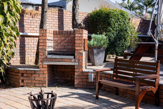 Outdoor braai area beside the pool at Bon A Vie, Gonubie, East London