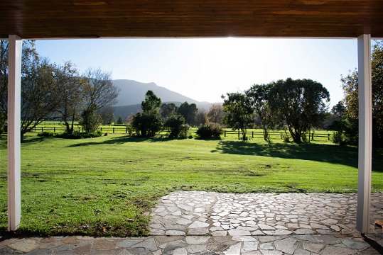 Views of the dairy farm fields with  the Tsitsikamma mountains in the background from the front of Natures Way Farmhouse