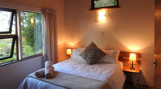A lot of natural lighting with double bed at Natures Way Farm Cottage A lot of natural lighting with double bed at Natures Way Farm Cottage