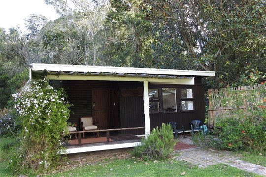 The original wooden Natures Way Farm Cottage front porch 