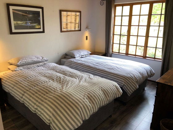 Downstairs bedroom 2, with 2, 3/4 beds