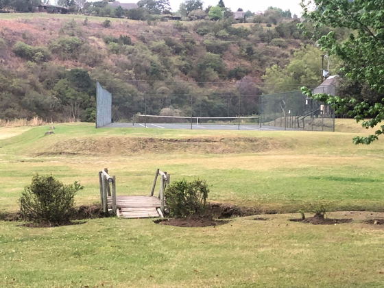 A short walk over the bridge to the Tennis Court
