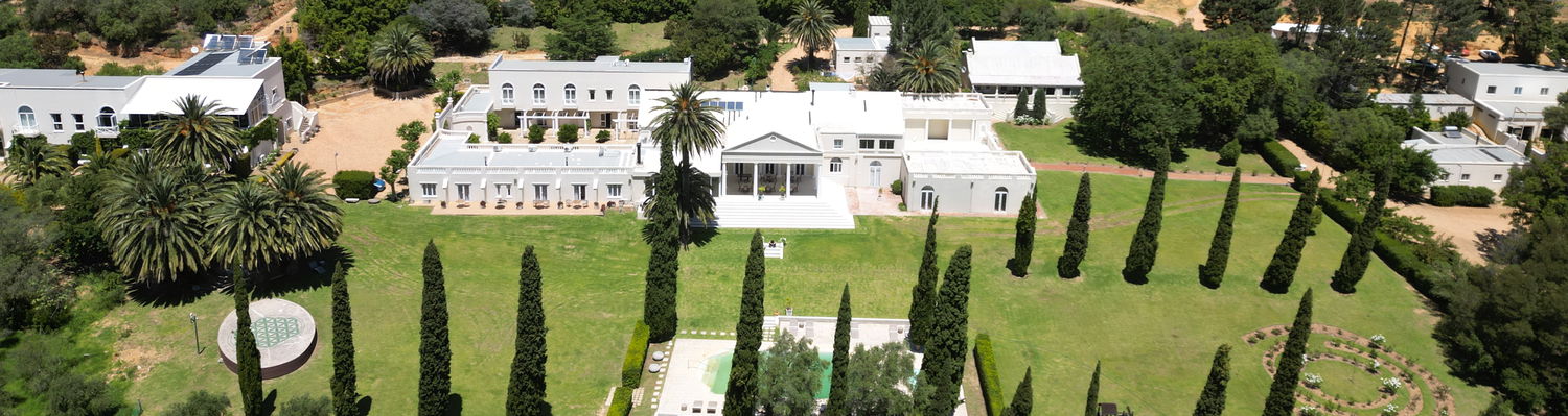 view of the estate with mountains in the background - this is where you will stay during your workshop