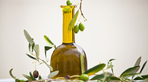 Olives with oil flask