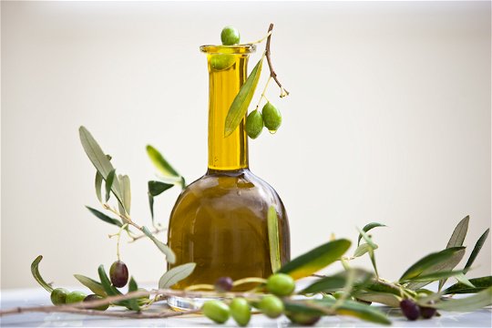 Olives with oil flask