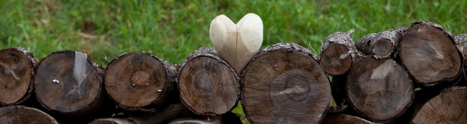 wooden heart on wooden wall