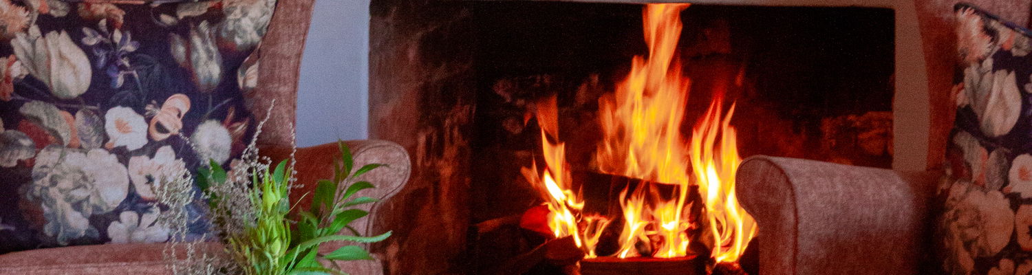 Inside fireplaces at all our accommodation