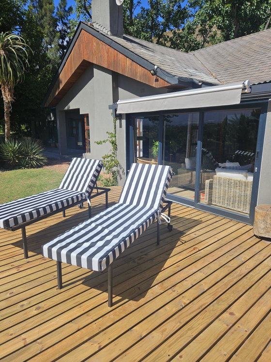 Country Manor deck with recliner beds