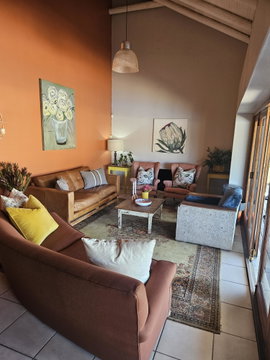 Coetzer house living area with inside fireplace Coetzer house living area with inside fireplace