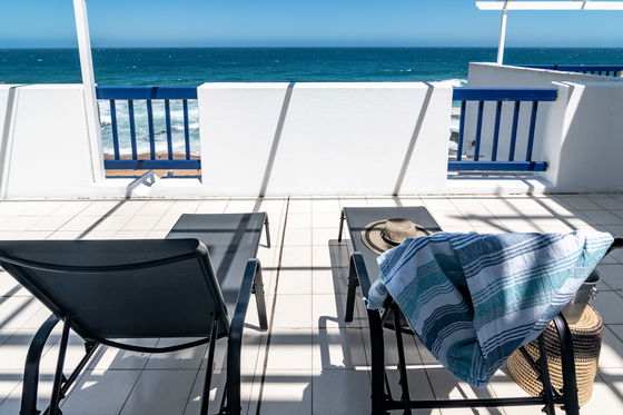 Two sun lounges for sun tanning.