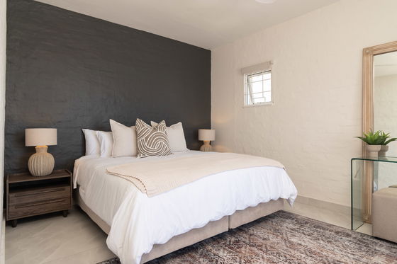 The main bedroom with its en-suite bathroom has a stunning view of the sea.