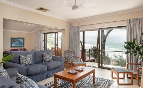 Open plan lounge with breaker views