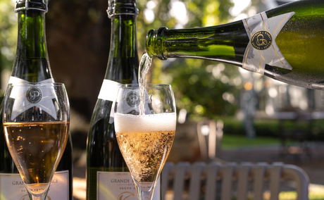 Two glasses filled with champagne for a couple at grande provence