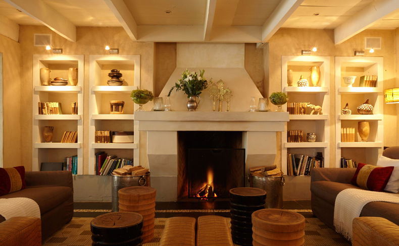 A well lit and warm family living room with a stunning fire place, at grande provence A well lit and warm family living room with a stunning fire place, at grande provence