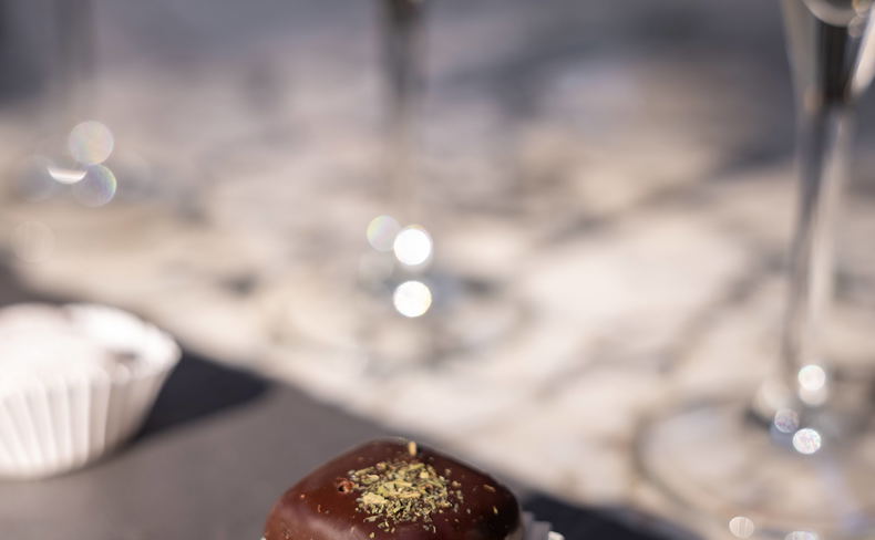 A chocolate cup cake on a dining table from Grande Provence, for a birthday celebration A chocolate cup cake on a dining table from Grande Provence, for a birthday celebration