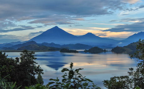 View of Mt Gahinga Mt Muhavura from Lake Mutanda Uganda View of Mt Gahinga Mt Muhavura from Lake Mutanda Uganda