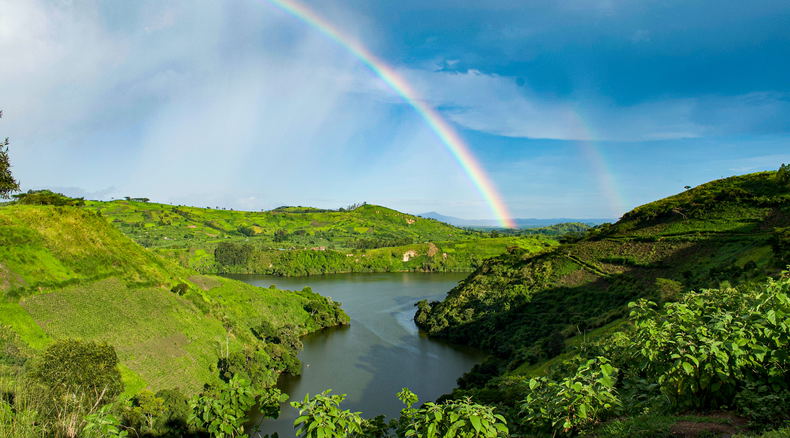 A rainbow in Ndali-Kasenda crater lake fields Kibale National Park, Uganda