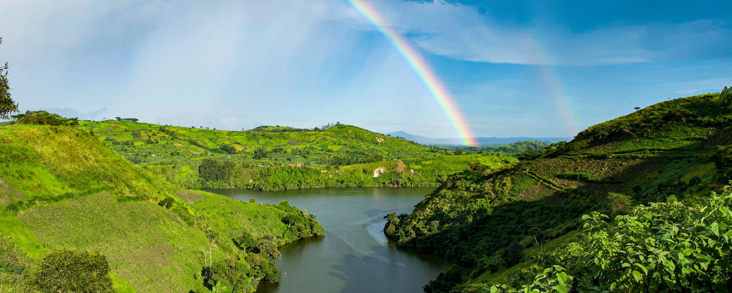A rainbow in Ndali-Kasenda crater lake fields Kibale National Park, Uganda