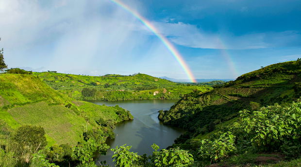 A rainbow in Ndali-Kasenda crater lake fields Kibale National Park, Uganda