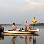 Kids fishing for tigerfish