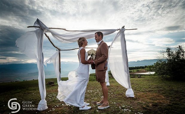 Bride And Groom At An Outdoor Altar At Drakensberg Mountain Retreat