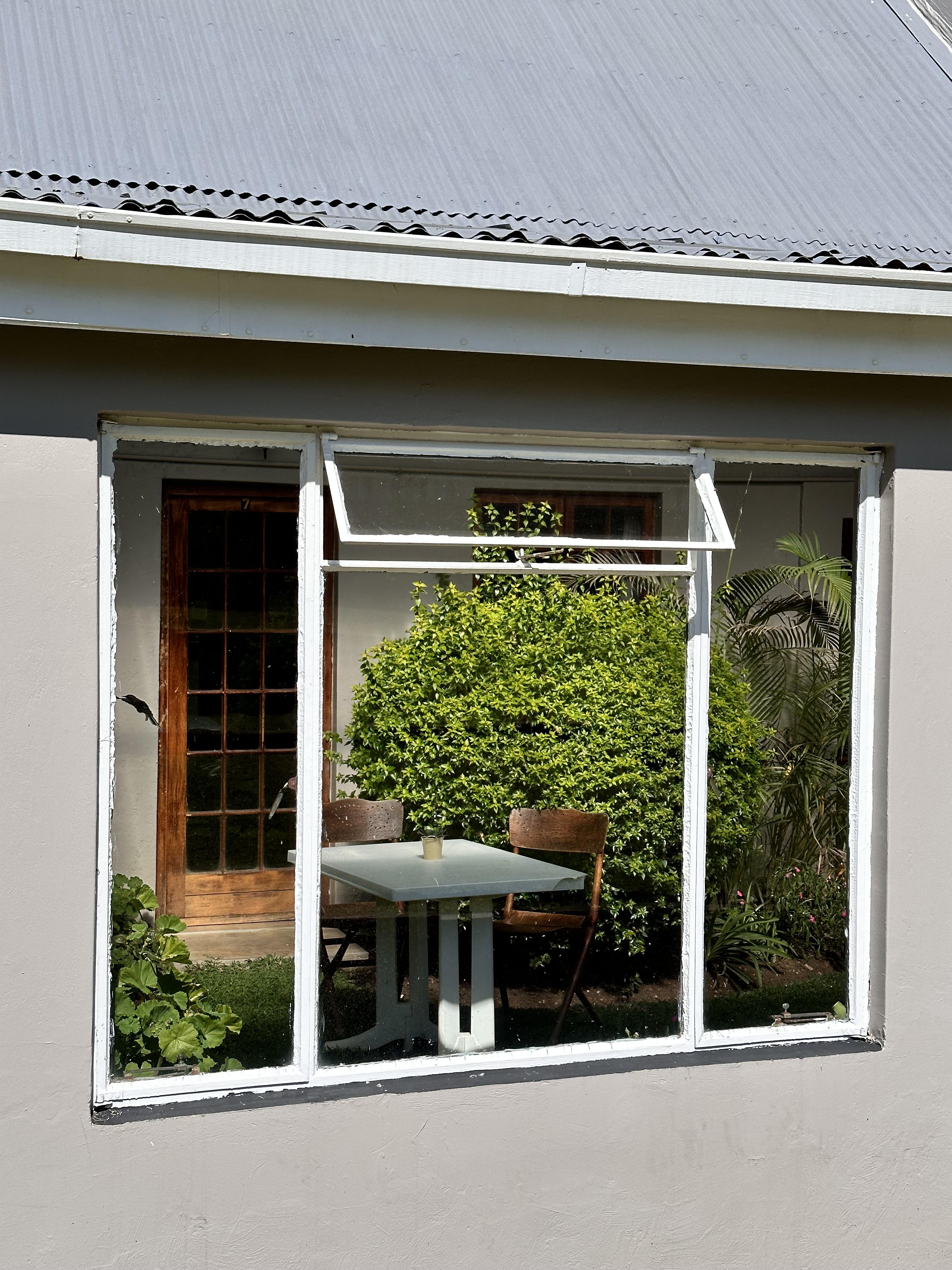 Room 7 Standard Conservatory Triple pet-friendly unit with garden access, en-suite bathroom and tea/coffee station