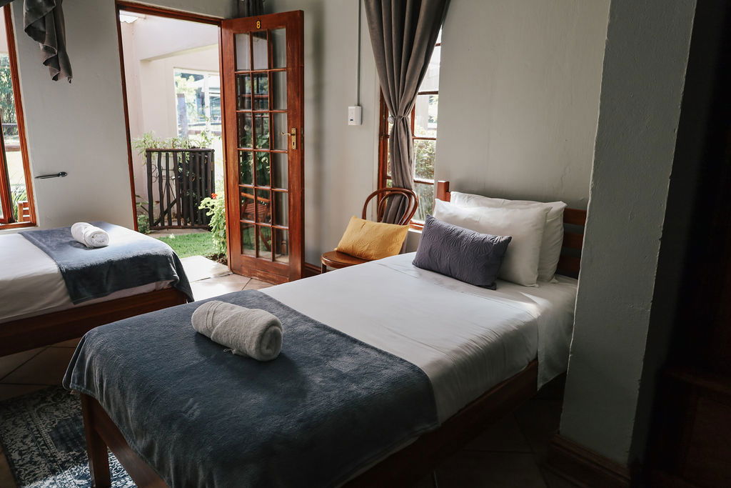 Room 8 Standard Conservatory Family sleeping a family of four and the pet dog with access to the conservatory garden, en-suite bathroom and tea/coffee station