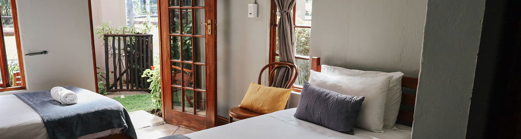Room 8 Standard Conservatory Family sleeping a family of four and the pet dog with access to the conservatory garden, en-suite bathroom and tea/coffee station