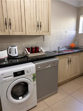 Scullery with washing machine & dishwasher